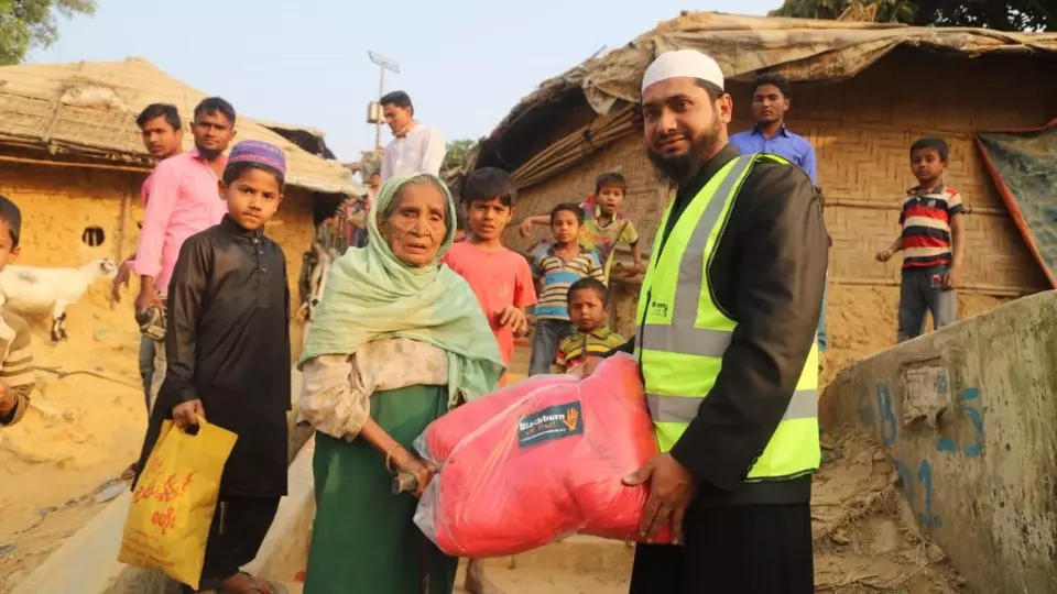 Group of people including elderly woman in India